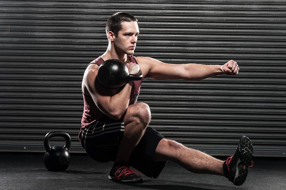 pistol squat with kettlebell